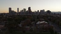 5.7K stock footage aerial video of approaching the city's skyline at sunset, Downtown Denver, Colorado Aerial Stock Footage | DX0001_001855