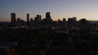 5.7K stock footage aerial video of a stationary view of the city's skyline at twilight, Downtown Denver, Colorado Aerial Stock Footage | DX0001_001875