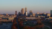 5.7K stock footage aerial video of a wide view of the city's skyline at sunset, Downtown Indianapolis, Indiana Aerial Stock Footage | DX0001_002932