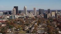5.7K stock footage aerial video of slowly flying by the city's skyline, seen from apartment buildings, Downtown Louisville, Kentucky Aerial Stock Footage | DX0001_002981