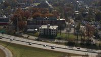 5.7K stock footage aerial video flyby and away from a health clinic behind historic hospital in Louisville, Kentucky Aerial Stock Footage | DX0001_003007