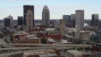 5.7K stock footage aerial video of city skyline seen while flying by freeway offramp in Downtown Louisville, Kentucky Aerial Stock Footage | DX0001_003020