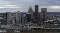 5.7K stock footage aerial video approach riverfront hotel and the city skyline from the river in Downtown Louisville, Kentucky Aerial Stock Footage | DX0001_003043