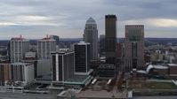5.7K stock footage aerial video reverse view of riverfront hotel and the city skyline, reveal the river in Downtown Louisville, Kentucky Aerial Stock Footage | DX0001_003044