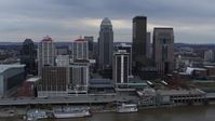 5.7K stock footage aerial video reverse view of skyline and hotel, revealing the Ohio River in Downtown Louisville, Kentucky Aerial Stock Footage | DX0001_003050