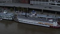5.7K stock footage aerial video close-up view of the historic riverboat docked by Downtown Louisville, Kentucky Aerial Stock Footage | DX0001_003064