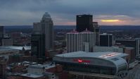 5.7K stock footage aerial video fly away from the arena and city skyline at sunset, Downtown Louisville, Kentucky Aerial Stock Footage | DX0001_003087