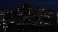 5.7K stock footage aerial video slowly flying past the city skyline at twilight, seen from the river, Downtown Louisville, Kentucky Aerial Stock Footage | DX0001_003121