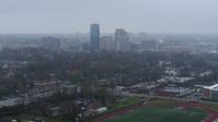 5.7K stock footage aerial video slowly flying by the city skyline seen from residential neighborhoods, Downtown Lexington, Kentucky Aerial Stock Footage | DX0001_003208
