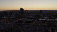 5.7K stock footage aerial video of a wide orbit of Albuquerque Plaza, Hyatt Regency and city high-rises at sunset, Downtown Albuquerque, New Mexico Aerial Stock Footage | DX0002_123_017