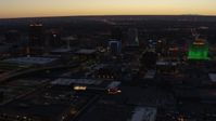 5.7K stock footage aerial video flyby hotel and nearby office buildings at twilight, Downtown Albuquerque, New Mexico Aerial Stock Footage | DX0002_123_025