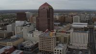 5.7K stock footage aerial video fly toward Albuquerque Plaza and neighboring city buildings, Downtown Albuquerque, New Mexico Aerial Stock Footage | DX0002_127_010