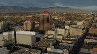 5.7K stock footage aerial video ascend and fly away from office high-rise building, Downtown Albuquerque, New Mexico Aerial Stock Footage | DX0002_127_039