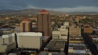 5.7K stock footage aerial video approach and then orbit office high-rise at the center of city buildings, Downtown Albuquerque, New Mexico Aerial Stock Footage | DX0002_127_042
