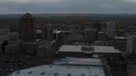 5.7K stock footage aerial video orbit office high-rise, hotel, and the Kiva Auditorium at sunset, Downtown Albuquerque, New Mexico Aerial Stock Footage | DX0002_128_006