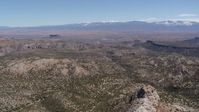 5.7K stock footage aerial video of flying away from desert mesas and distant mountains in New Mexico Aerial Stock Footage | DX0002_133_014