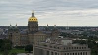 5.7K stock footage aerial video ascend by government office building for view of the Iowa State Capitol, Des Moines, Iowa Aerial Stock Footage | DX0002_166_014
