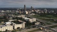 5.7K stock footage aerial video of the city's skyline seen from university and apartment complex, Downtown Omaha, Nebraska Aerial Stock Footage | DX0002_170_010