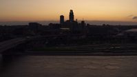5.7K stock footage aerial video of a reverse view of the skyline at twilight, Downtown Omaha, Nebraska Aerial Stock Footage | DX0002_172_041
