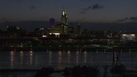 5.7K stock footage aerial video fly low over the river toward the city's skyline at twilight, Downtown Omaha, Nebraska Aerial Stock Footage | DX0002_173_013