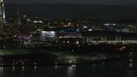 5.7K stock footage aerial video orbiting arena and convention center complex at night, Downtown Omaha, Nebraska Aerial Stock Footage | DX0002_173_026
