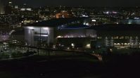 5.7K stock footage aerial video ascend and orbit arena and convention center complex at night, Downtown Omaha, Nebraska Aerial Stock Footage | DX0002_173_030