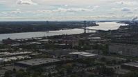 5.7K stock footage aerial video of the Ambassador Bridge spanning the Detroit River, Detroit, Michigan Aerial Stock Footage | DX0002_190_005