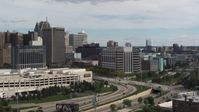 5.7K stock footage aerial video an orbit of the downtown police headquarters, Downtown Detroit, Michigan Aerial Stock Footage | DX0002_190_014