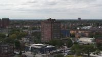 5.7K stock footage aerial video of circling a brick apartment building, Detroit, Michigan Aerial Stock Footage | DX0002_190_047