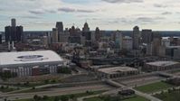 5.7K stock footage aerial video the skyline behind Ford Field and Comerica Park stadiums, Downtown Detroit, Michigan Aerial Stock Footage | DX0002_191_010