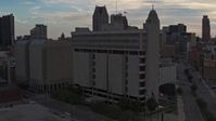 5.7K stock footage aerial video of the Frank Murphy Hall of Justice courthouse at sunset, Downtown Detroit, Michigan Aerial Stock Footage | DX0002_192_024