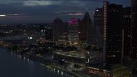 5.7K stock footage aerial video orbit a group of tall skyscrapers at twilight, reveal GM Renaissance Center, Downtown Detroit, Michigan Aerial Stock Footage | DX0002_193_008