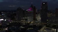 5.7K stock footage aerial video approach One Woodward Avenue skyscraper at twilight, Downtown Detroit, Michigan Aerial Stock Footage | DX0002_193_015