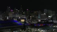 5.7K stock footage aerial video flyby sports stadiums and skyline at night, Downtown Detroit, Michigan Aerial Stock Footage | DX0002_193_052