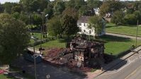 5.7K stock footage aerial video approach and orbit a demolished home in Detroit, Michigan Aerial Stock Footage | DX0002_195_004