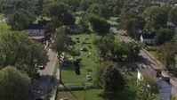 5.7K stock footage aerial video of circling the Heidelberg Project art display in Detroit, Michigan Aerial Stock Footage | DX0002_195_005