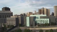 5.7K stock footage aerial video focus on the Detroit Public Safety Headquarters while ascending in Downtown Detroit, Michigan Aerial Stock Footage | DX0002_196_046