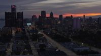 5.7K stock footage aerial video of slowly passing the city's towering skyscrapers at twilight, Downtown Detroit, Michigan Aerial Stock Footage | DX0002_198_013