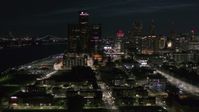 5.7K stock footage aerial video GM Renaissance Center and brightly lit skyscrapers at night, Downtown Detroit, Michigan Aerial Stock Footage | DX0002_198_039