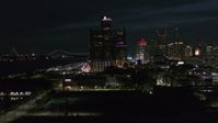 5.7K stock footage aerial video GM Renaissance Center while flying toward river at night, Downtown Detroit, Michigan Aerial Stock Footage | DX0002_198_042