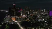 5.7K stock footage aerial video approach and flyby GM Renaissance Center and skyscrapers from river at night, Downtown Detroit, Michigan Aerial Stock Footage | DX0002_198_045