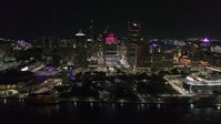 5.7K stock footage aerial video of circling Hart Plaza and skyscrapers at night, seen from the river, Downtown Detroit, Michigan Aerial Stock Footage | DX0002_199_020