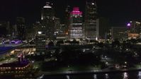 5.7K stock footage aerial video orbit riverfront Hart Plaza, focus on tall skyscrapers at night, Downtown Detroit, Michigan Aerial Stock Footage | DX0002_199_024