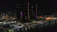 5.7K stock footage aerial video of orbiting GM Renaissance Center by the river at night, Downtown Detroit, Michigan Aerial Stock Footage | DX0002_199_027