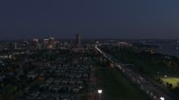 5.7K stock footage aerial video flyby I-190 leading to skyline at twilight, Downtown Buffalo, New York Aerial Stock Footage | DX0002_204_050