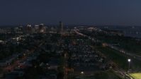 5.7K stock footage aerial video descending with view of Seneca One Tower and skyline at twilight, Downtown Buffalo, New York Aerial Stock Footage | DX0002_204_055