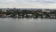 5.7K stock footage aerial video of passing by waterfront mansions in Tampa, Florida Aerial Stock Footage | DX0003_230_017