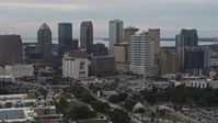 5.7K stock footage aerial video descend while focused on tall skyscrapers in the city's skyline, Downtown Tampa, Florida Aerial Stock Footage | DX0003_230_046