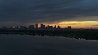 5.7K stock footage aerial video wide view of the distant city skyline of Downtown Tampa, Florida at sunset Aerial Stock Footage | DX0003_231_041