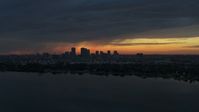 5.7K stock footage aerial video a view of the Downtown Tampa skyline from the bay at sunset, Florida Aerial Stock Footage | DX0003_231_050